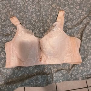 A beautiful Lacy pink supportive bra with jemstone, adjustable straps for